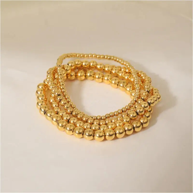 Aquilea - bracelets en perles d'or-0