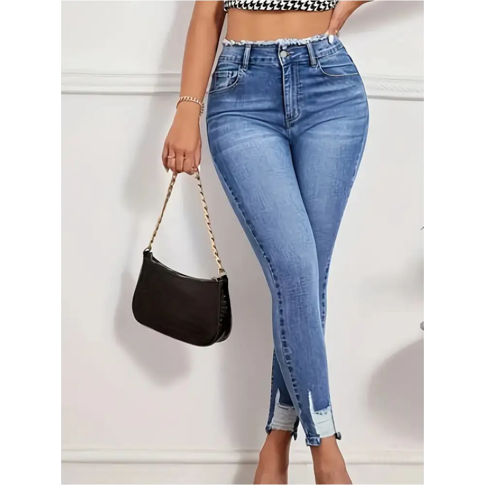 Jean moulant taille haute en denim bleu - Jean