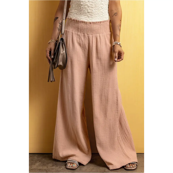 Pantalon large rose à taille smockée et froissé-0